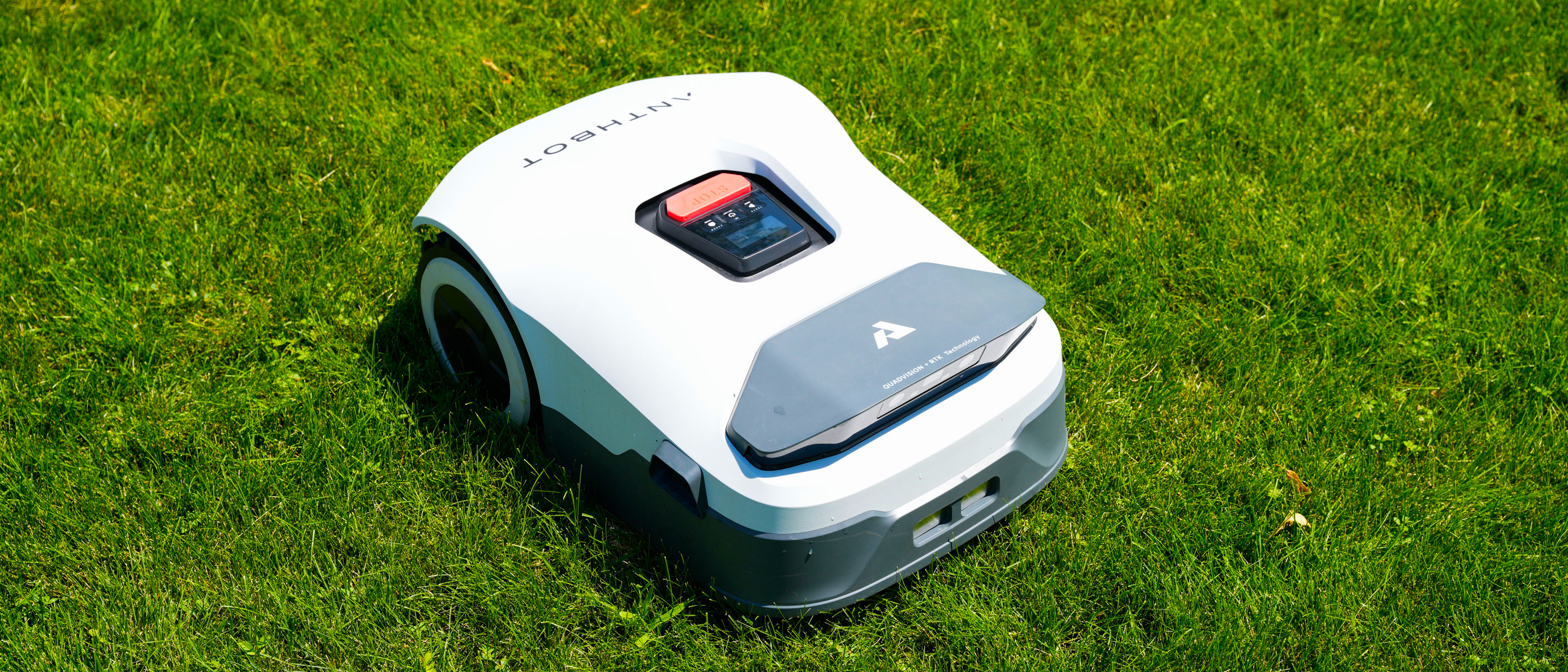 Anthbot Genie 3000 being tested in a bright green yard