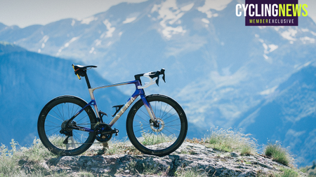 Seka Spear road bike perched on a rock in the Alps