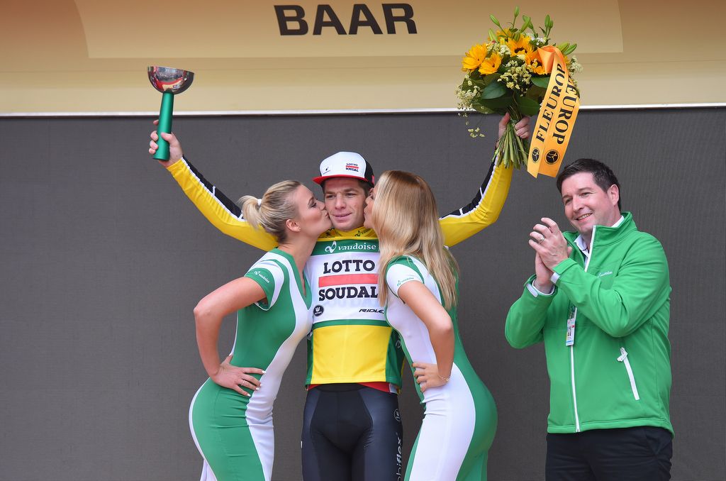 J&uuml;rgen Roelandts (Lotto Soudal) on the podium as the yellow jersey holder