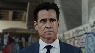 John Sugar standing in front of grafitti-covered walls outside in Sugar Season 2