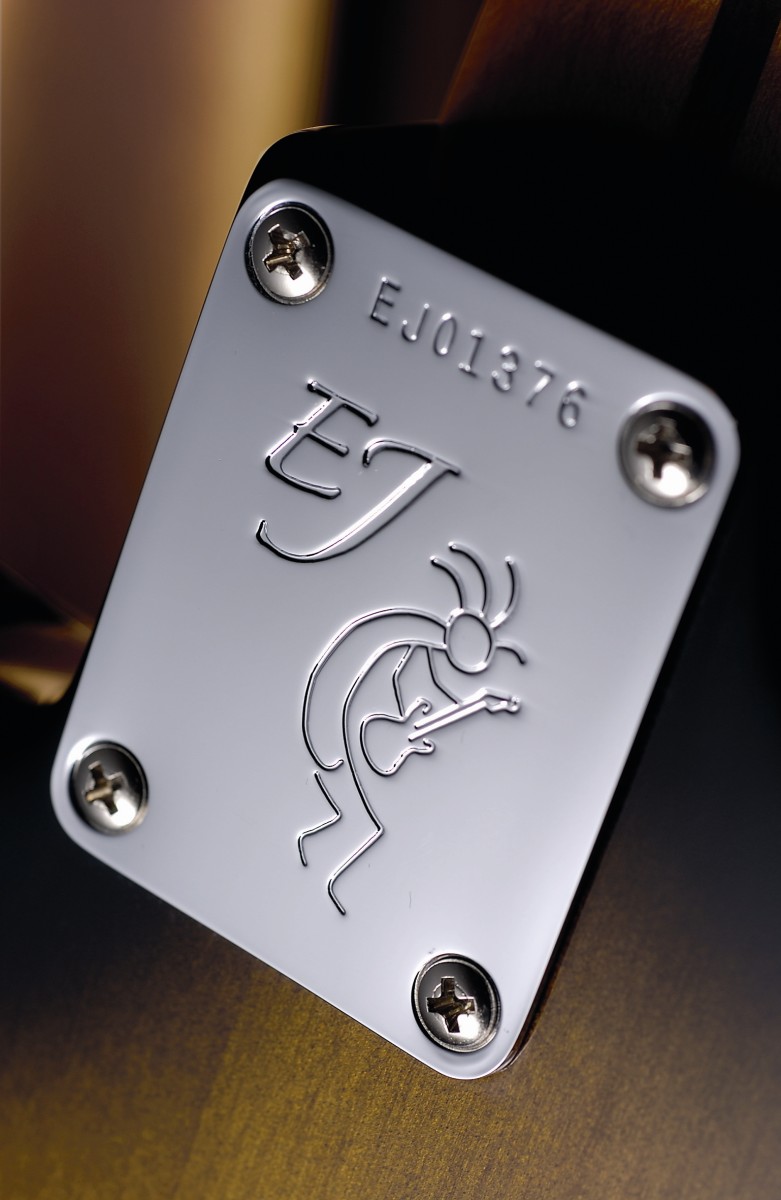 The neckplate depicts Kokopelli - a Native American symbol for the 'mischievous minstrel'