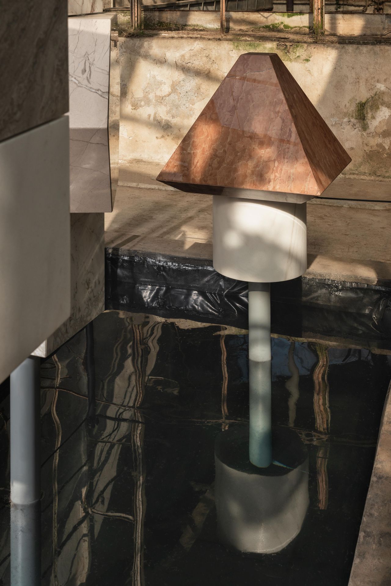 Sculptural Marble objects in abandoned glasshouse