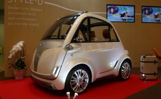 This front-hatched, single-door, two-seater city car with retro button-quilted seating was a genuine Tokyo Motorshow surprise