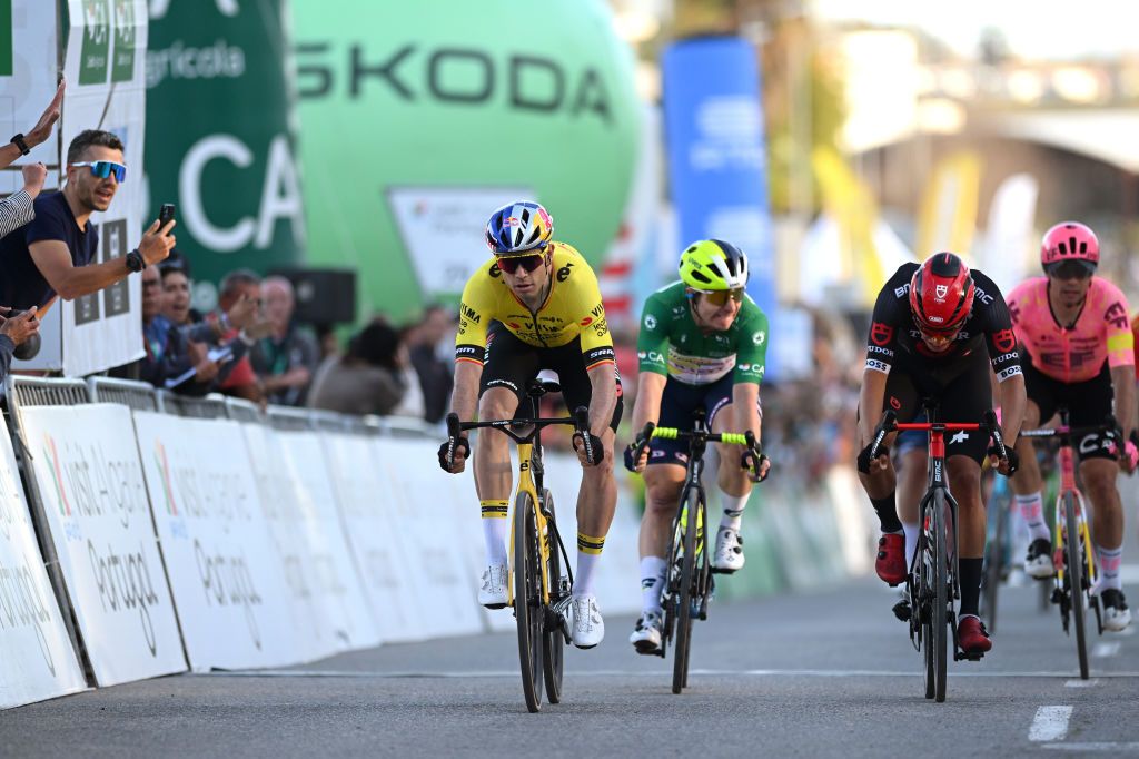 TAVIRA PORTUGAL FEBRUARY 16 LR Stage winner Wout Van Aert of Belgium and Team Visma Lease a Bike Gerben Thijssen of Belgium and Team Intermarche Wanty Green Points Jersey and Marius Mayrhofer of Germany and Tudor Pro Cycling Team sprint at finish line during the 50th Volta ao Algarve em Bicicleta 2024 Stage 3 a 1922km stage from Vila Real de Santo Antonio to Tavira on February 16 2024 in Tavira Portugal Photo by Dario BelingheriGetty Images