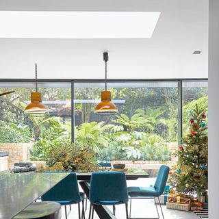 dining room with christmas tree