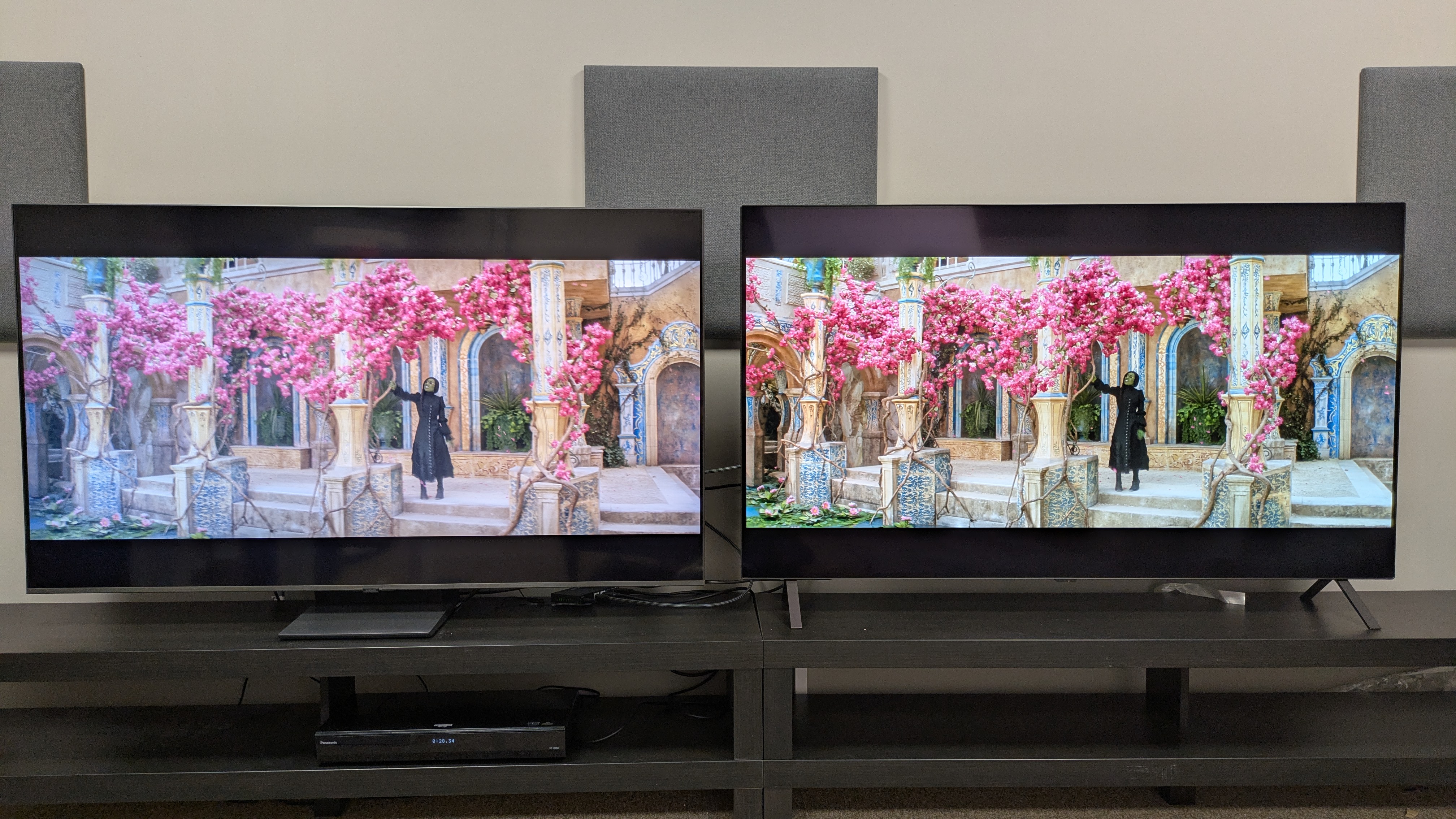 Samsung QN80F (left) and LG B5 (right) showing Elphaba from Wicked on screen