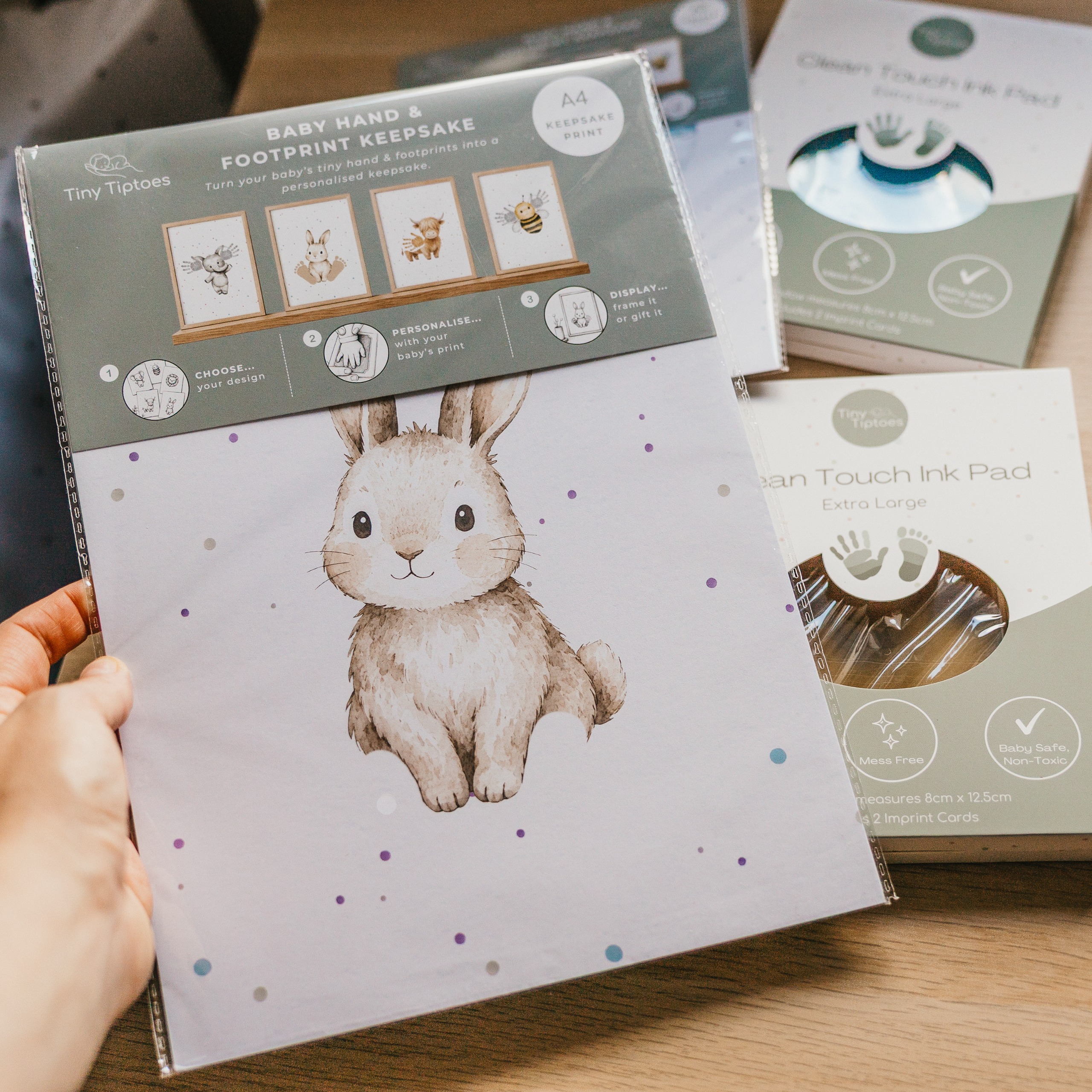 A close-up of a Tiny Tiptoes baby hand &amp;amp; footprint keepsake