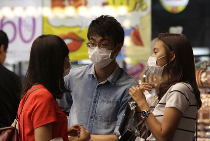 People wearing masks in South Korea.