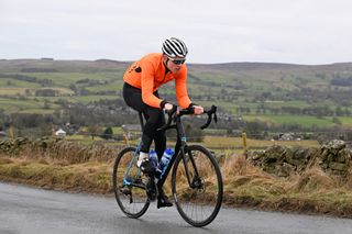 Male cyclist suffering from shoulder pain while cycling