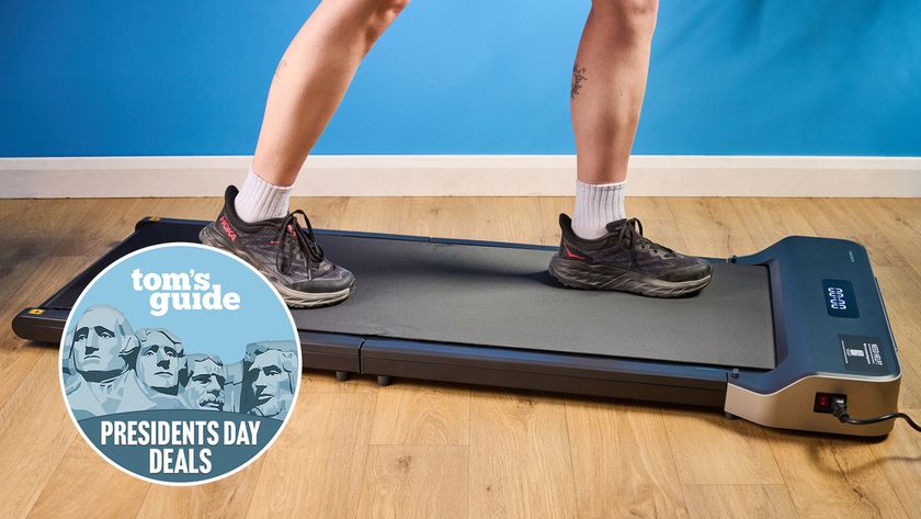 person walking on the walkingpad z1 with a presidents' day deals badge