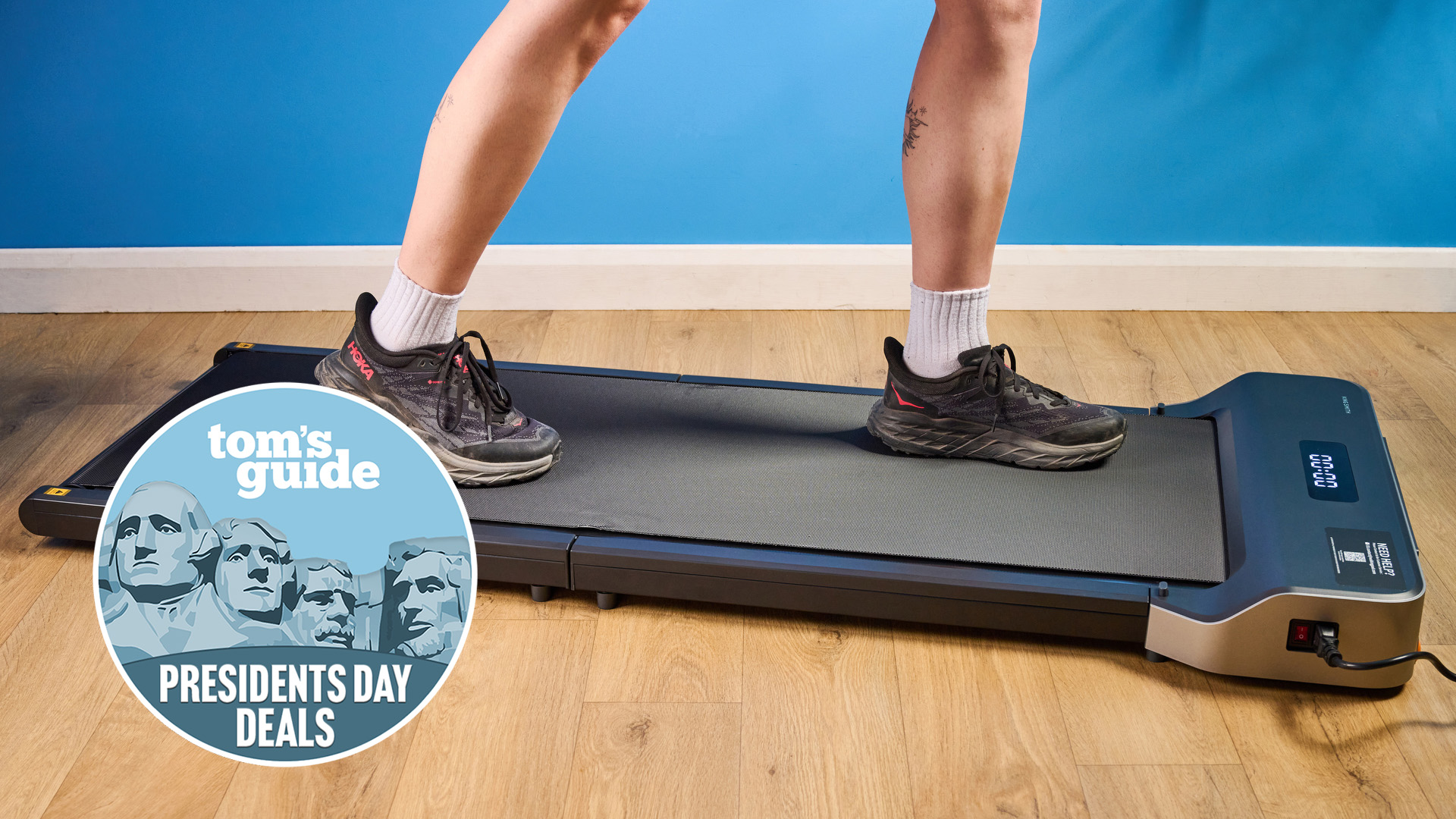 person walking on the walkingpad z1 with a presidents' day deals badge