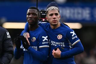 Moises Caicedo and Enzo Fernandez of Chelsea during the Premier League match between Chelsea FC and Fulham FC at Stamford Bridge on January 13, 2024 in London, England.