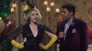 Natasha Lyonne in a funny hat next to Kenan Thompson on Saturday Night Live