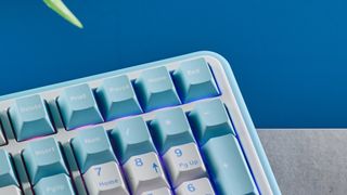 A white and blue Epomaker TH99 96% mechanical keyboard