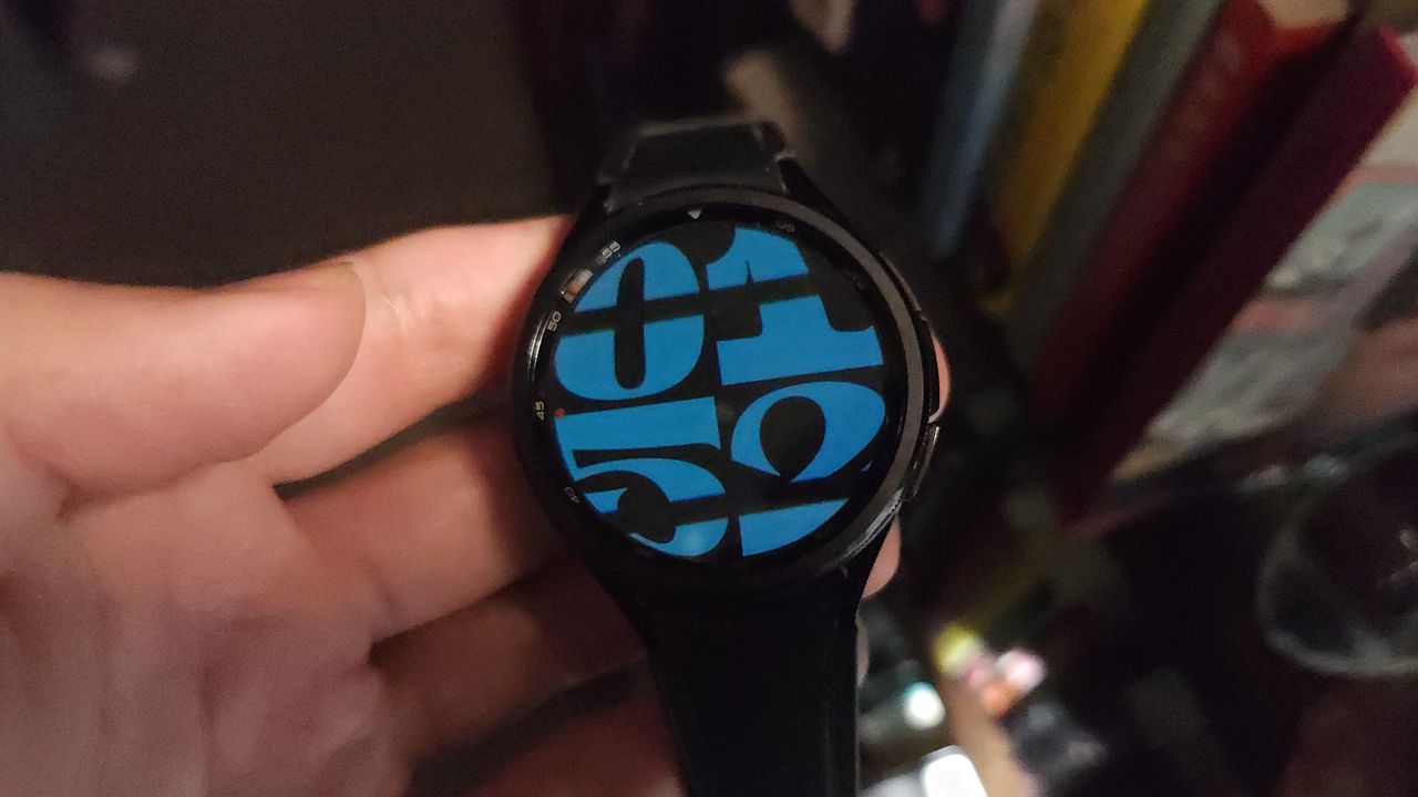 A photo of the Samsung Galaxy Watch 6 Classic showing thick black bars over the display, indicating that the display uses PWM dimming.
