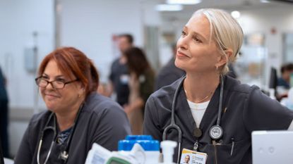 Dana and the nursing team look at something offscreen