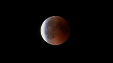 lunar eclipse against a black sky