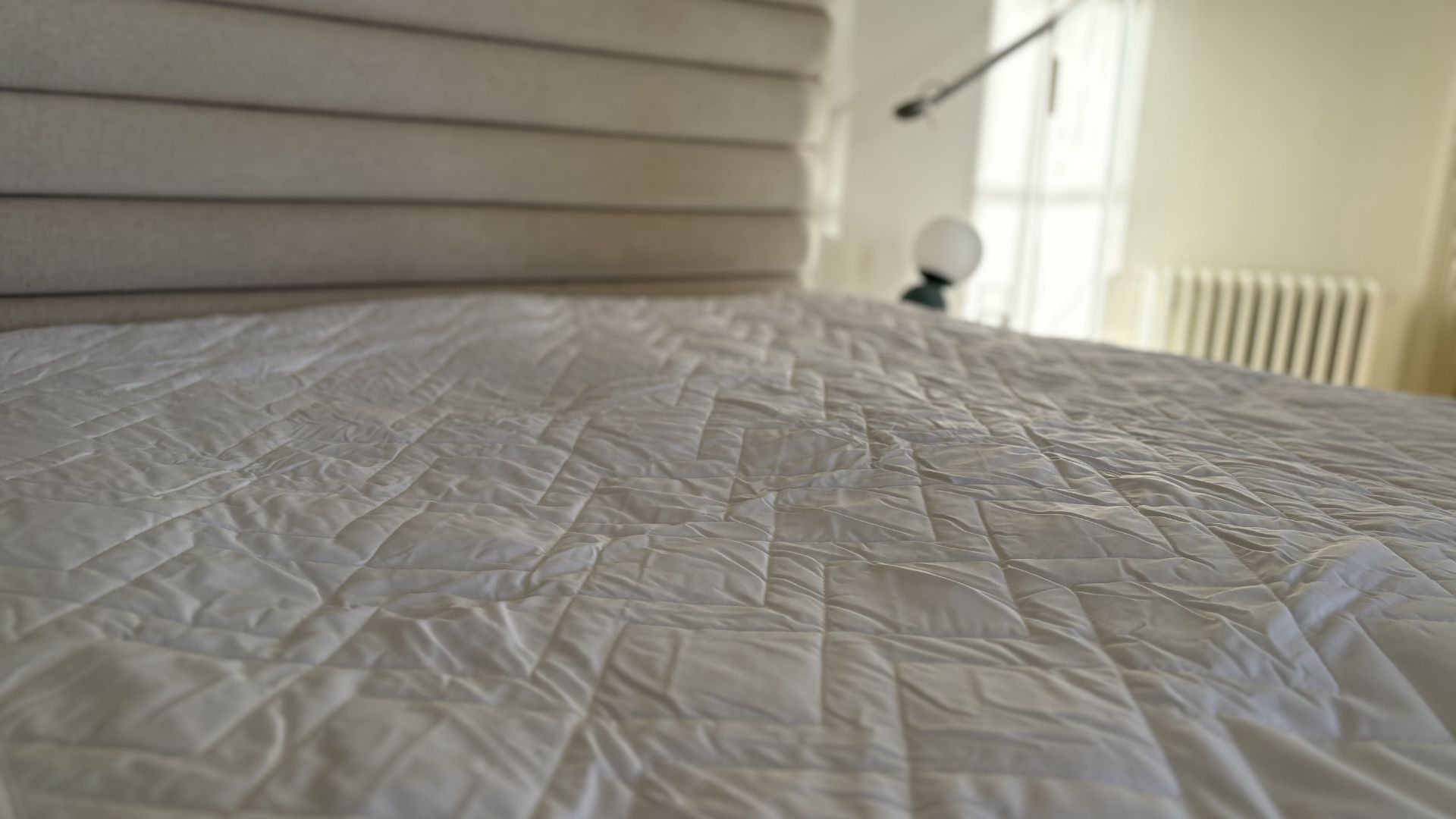 Simba Performance Mattress Protector being tested, on the bed