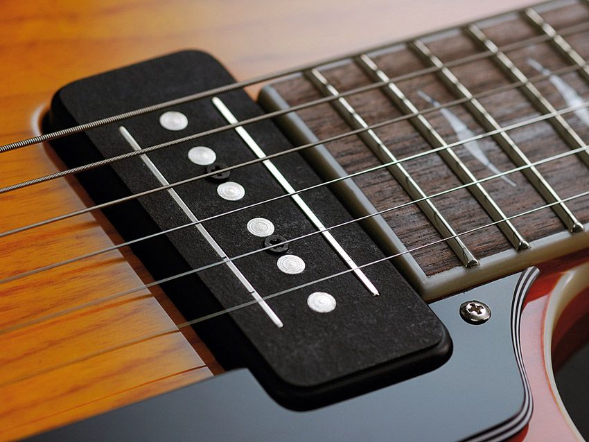 Kitted out with Vox's tri-mode CoAxe pickups.