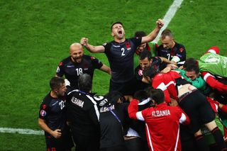 Albania players celebrate their goal against Romania at Euro 2016.