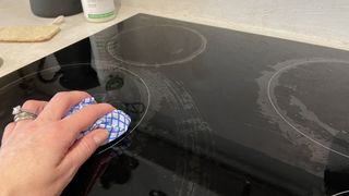 Wiping an induction hob clean