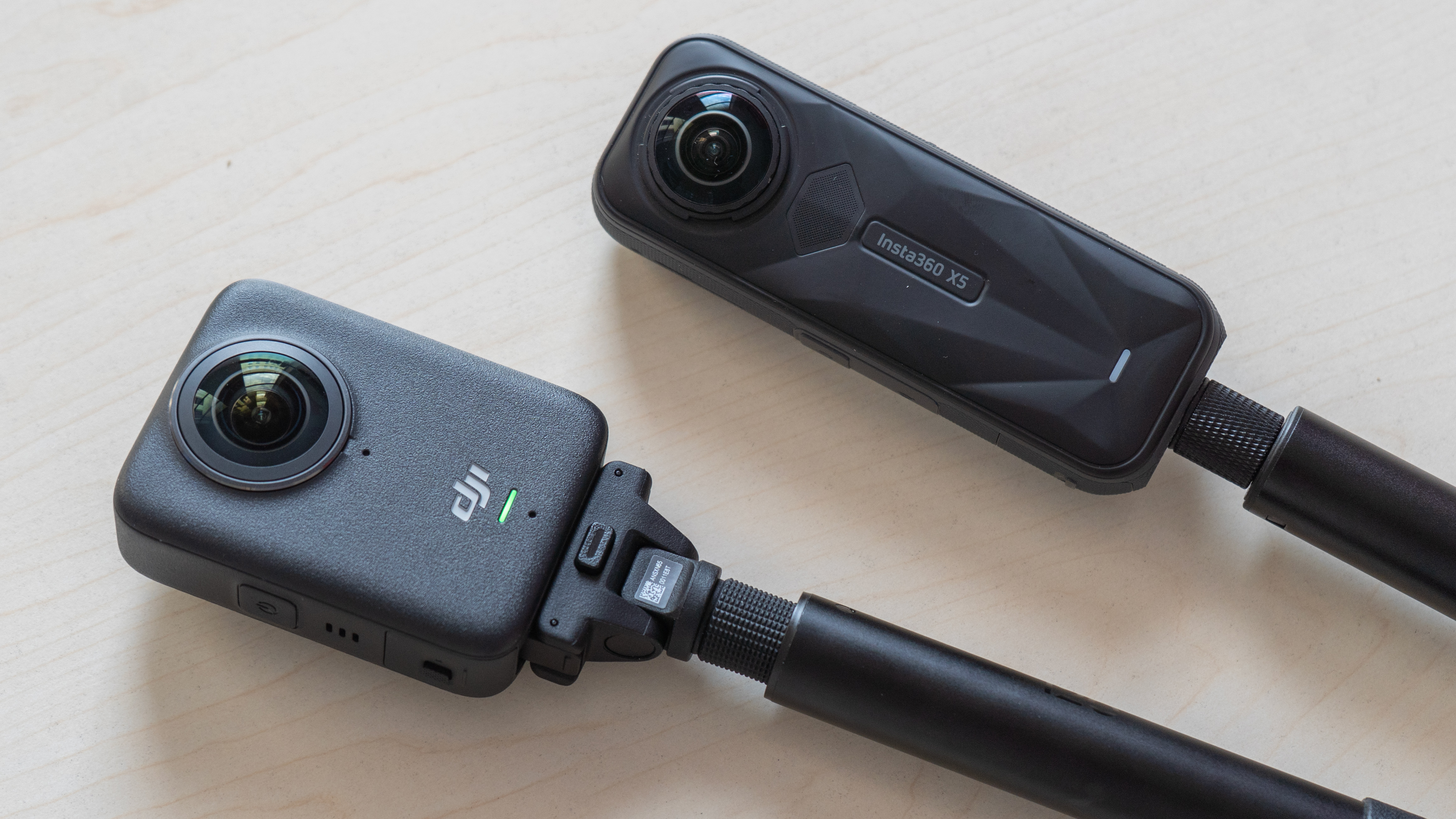 DJI Osmo 360 next to Insta360 X5