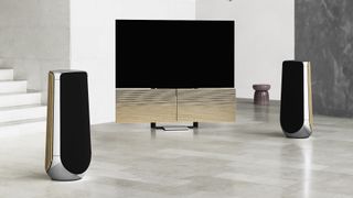 The Beovision Harmony's wing-shaped TV stand doubles as a built-in speaker system