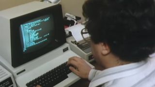 A "computer addict" typing on a home computer at, err, home.