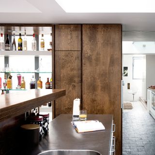 kitchen with wooden partition and wooden top