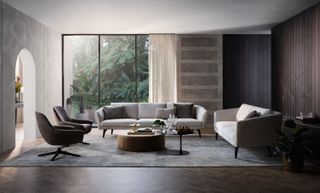 neutral living room with grey sofa and wood-clad wall by King Living