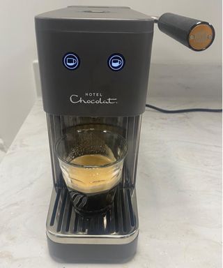 Making an espresso in the Hotel Chocolat Podster coffee machine