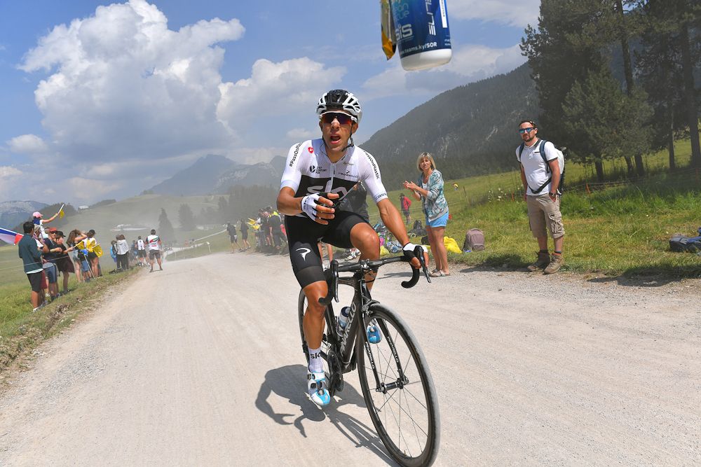 Jonathan Castroviejo (Team Sky) reaches for a beverage during stage 10 at the Tour de France