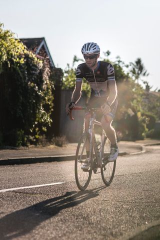 Image of Dr James Gill riding his bike