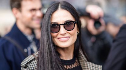 Demi Moore outside Dior, during Paris Fashion Week on February 25, 2020 in Paris, France. 