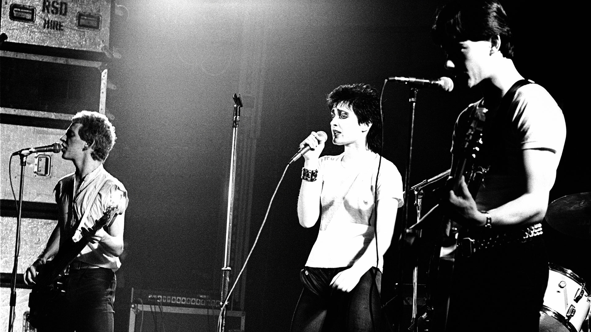 Steve Severin, Siouxsie Sioux and John McKay of Siouxsie and the Banshees perform on stage at the Rainbow Theatre, London, England, on November 20, 1977