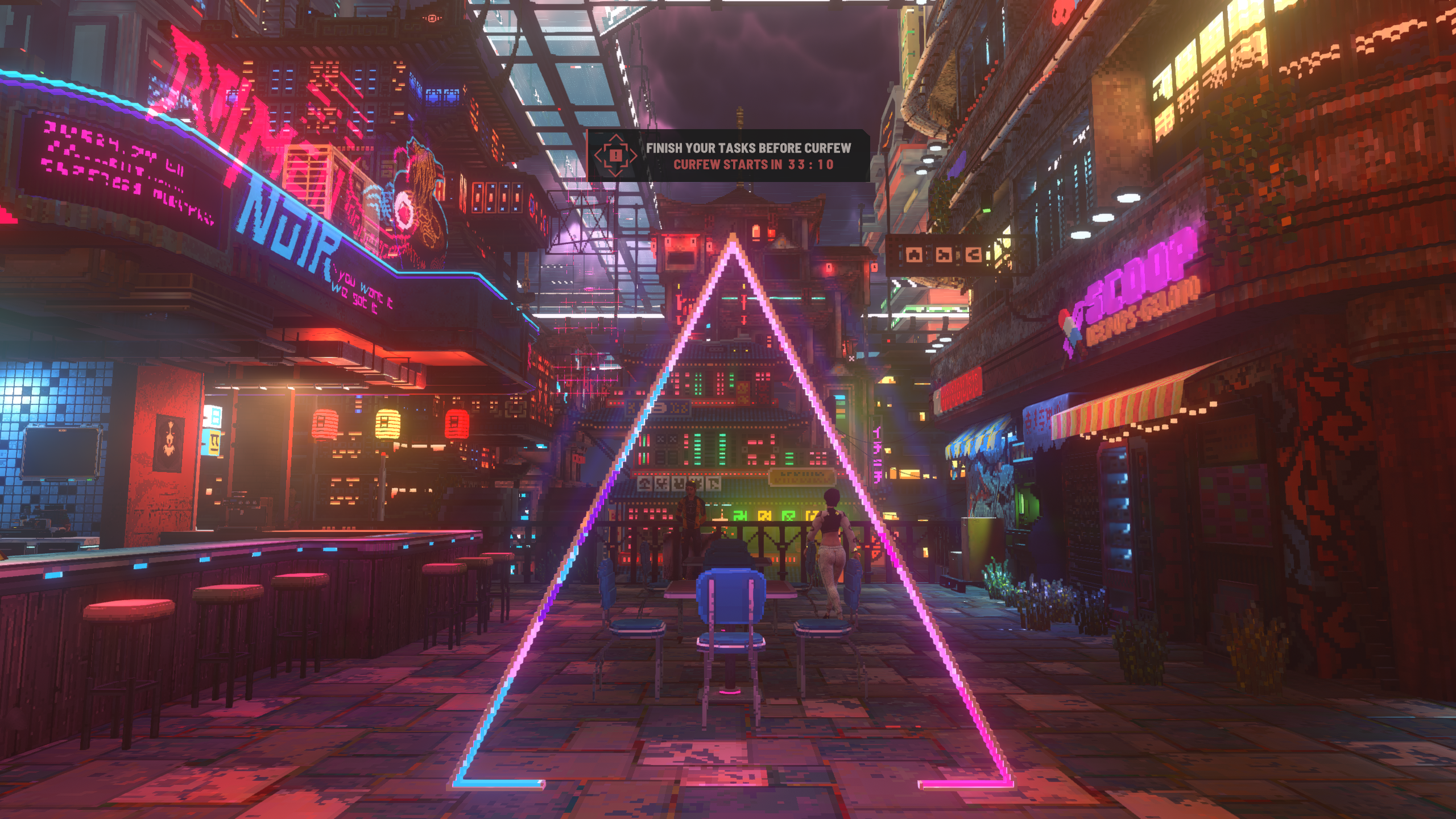 Nivalis Nights - a triangle neon light outside Ramen Noir noodle bar with two tables underneath.