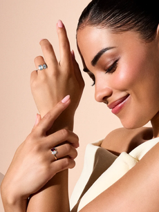 Model wearing two diamonds factory rings.
