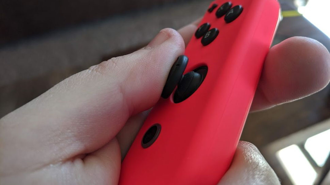 Tilt joystick to the side on Joy-Con