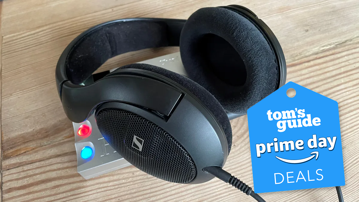 Photograph of Sennheiser HD 560S headphones on a desk with Prime Day deals tag