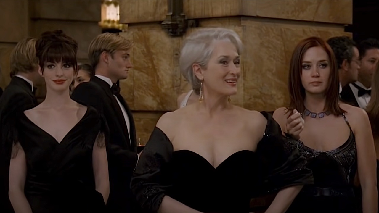 Anne Hathaway, Meryl Streep, and Emily Blunt at a fashion event in The Devil Wears Prada