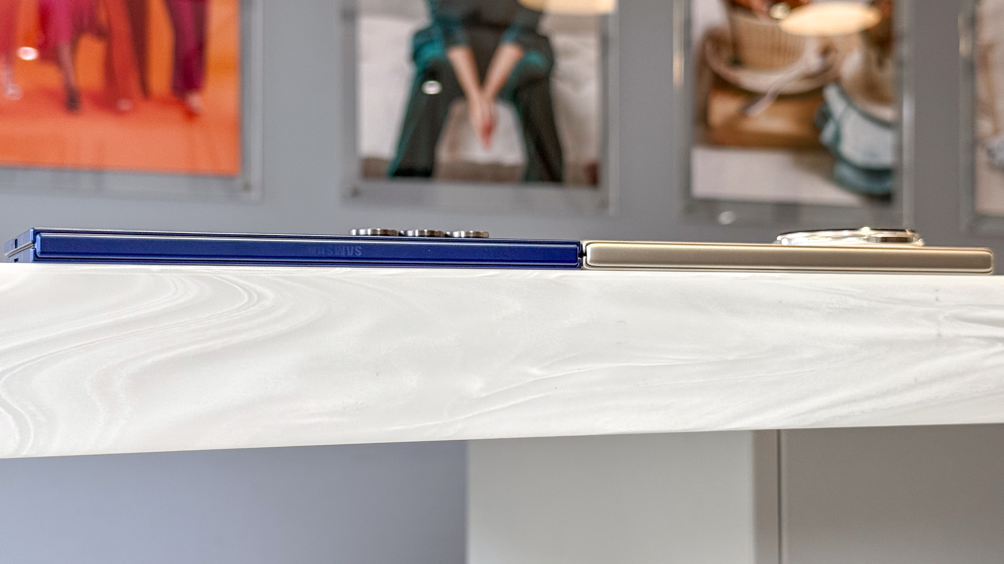 Honor Magic V5 and Samsung Galaxy Z Fold 7 laid face down on a table