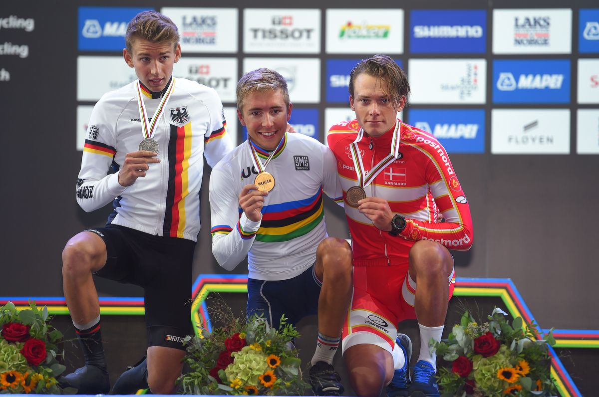 Lennard Kamna (Germany), Benoit Cosnefroy (France) and Michael Carbel Svendgaard (Denmark) pose for the photos