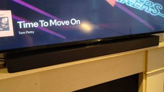 The Amazon Fire TV Soundbar Plus under an Amazon TV.