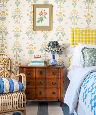 yellow and blue vintage bedroom with floral wallpaper