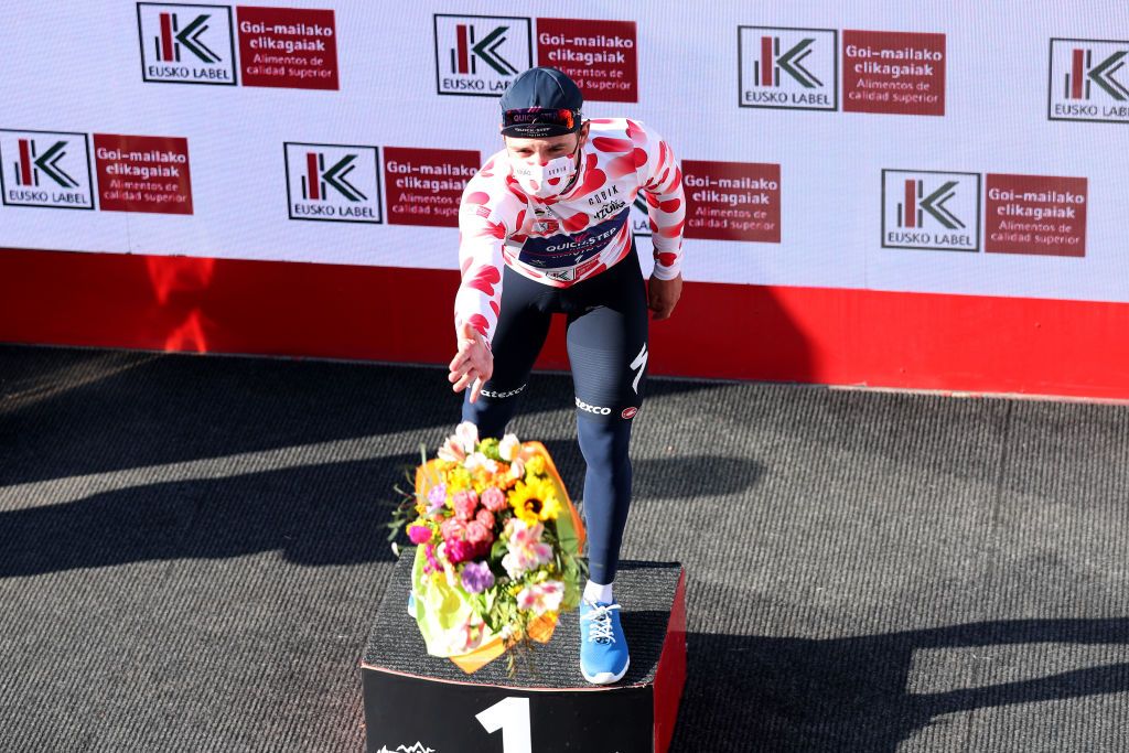 HONDARRIBIA SPAIN APRIL 04 Remco Evenepoel of Belgium and Team QuickStep Alpha Vinyl celebrates winning the polka dot mountain jersey on the podium ceremony after the 61st Itzulia Basque Country 2022 Stage 1 a 75km individual time trial from Hondarribia to Hondarribia itzulia WorldTour on April 04 2022 in Hondarribia Spain Photo by Gonzalo Arroyo MorenoGetty Images