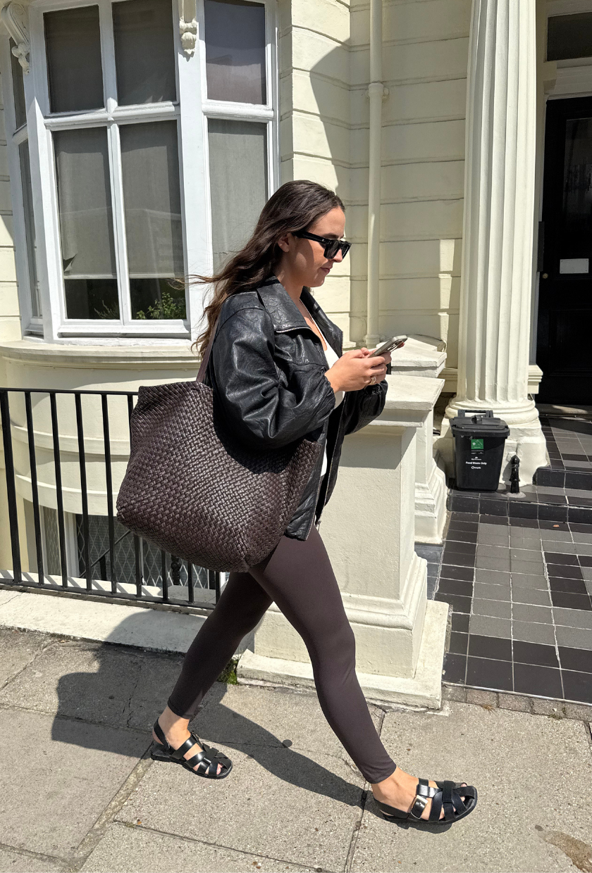 An image of Who What Wear's Ava Gilchrist reviewing Adanola ultimate wrap over leggings.
