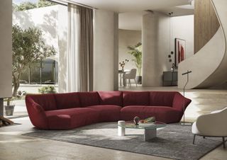 Comfortable looking ‘Timeless’ sofa in deep red fabric.