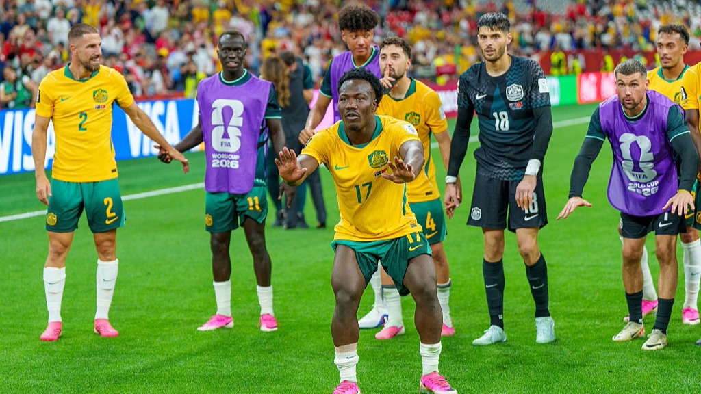 Nestory Irankunda leads the Australia celebrations with a crowd chant after the Socceroos beat Turkey 2-0 at the World Cup 2026