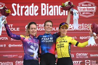 SIENA ITALY MARCH 08 LR Anna Van Der Breggen of Netherlands and Team SD Worx Protime on second place race winner Demi Vollering of Netherlands and Team FDJ SUEZ and Pauline FerrandPrevot of France and Team Visma Lease a Bike on third place pose on the podium ceremony after the 11st Strade Bianche 2025 Womens Elite a 136km one day race from Siena to Siena 320m UCIWWT on March 08 2025 in Siena Italy Photo by Dario BelingheriGetty Images