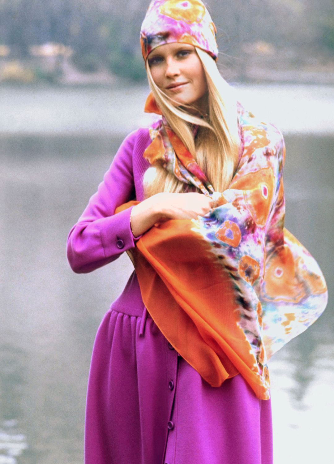 Model Gunilla Lindblad wearing violet knit shirtdress by Kimberly, tie-dyed scarf by Up Tied for Halston; Hair by Francois of Kenneth.